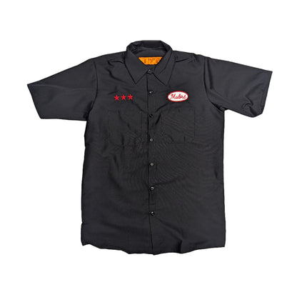 Black work shirt with logos on a white background